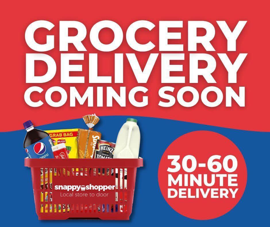 A red shopping basket with food items in it

Description automatically generated